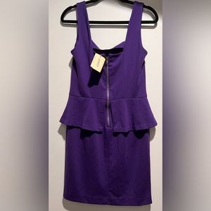 NEW WITH TAGS! Purple Peplum Dress! Size 8!
